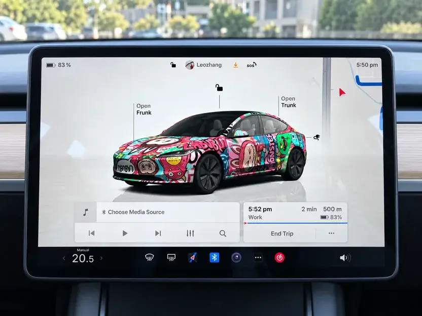 Illustration of a colorful custom wrap on a Tesla’s in-car touchscreen.